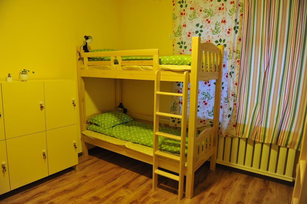Dalian Buzz Light Year Youth Hostel Habitación foto